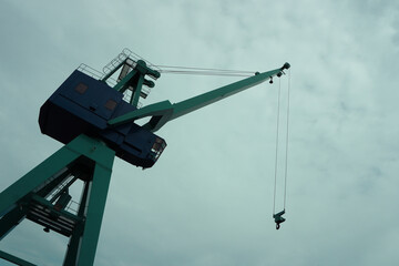 Low angle view of crane at port