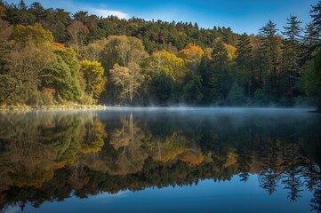 Fototapeta premium Enchanting lake beside an ancient enchanted forest once inhabited by the fairy Morgan, the setting of legendary Arthurian tales.