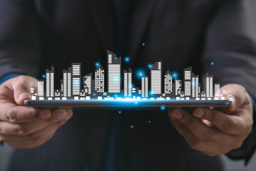 Smart city concept with digital building holograms above a tablet, symbolizing futuristic urban infrastructure, IoT technology, digital transformation, and smart solutions for modern cities.