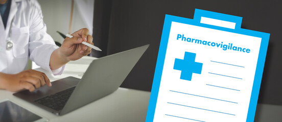 Pharmacovigilance concept with doctor working on laptop and medical report clipboard. Healthcare...