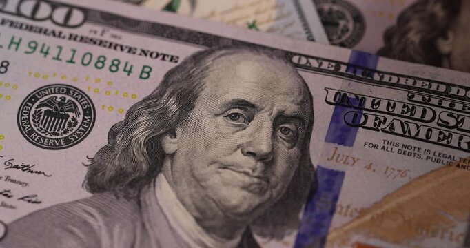  American banknotes with a face value of one hundred dollars, genuine American dollar banknotes with a hundred dollars in close-up