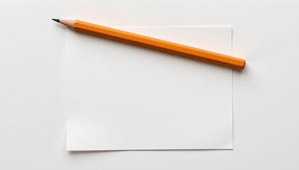 A single pencil resting atop a blank piece of paper, which is positioned against a light background.