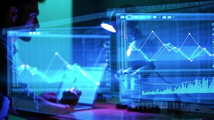 A man analyzes digital data graphs on laptop & screen in a dark, tech-filled workspace - Powered by Adobe