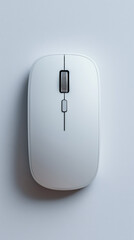 Top view of a modern white wireless computer mouse. Minimalist technology device on a gray background with copy space