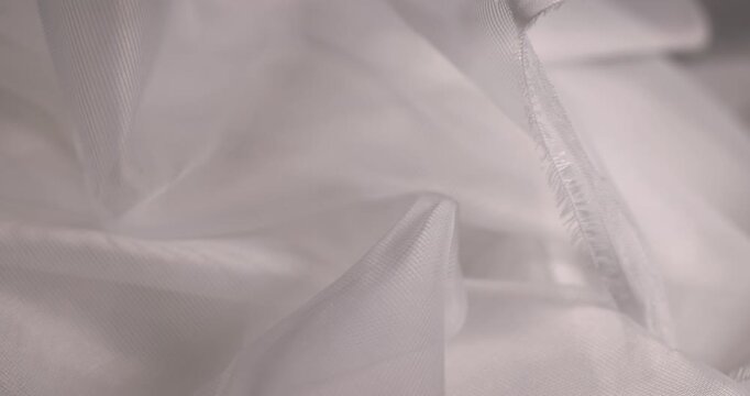 white tulle or curtains, finely woven synthetic threads for making tulle for windows in the home