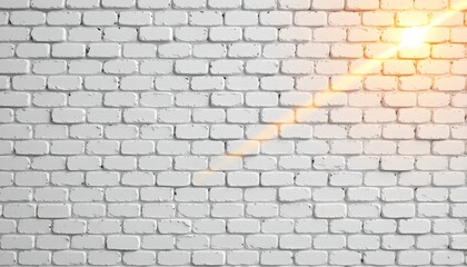 Obraz premium A close up of a textured brick wall with a light reflection cast onto it from an unseen source to the right.