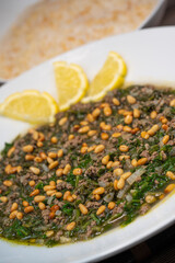 Spinach or Sabanekh with chicken a Mediterranean dish served with rice, Lebanese recipe. High quality photo