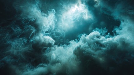 Fototapeta premium Abstract swirling smoke background in shades of teal and white studio shot