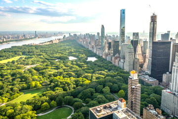 Aerial view of modern city skyline with skyscrapers parks and lush foliage