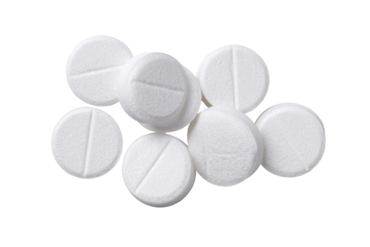 Pile of white, round pills with a dividing line