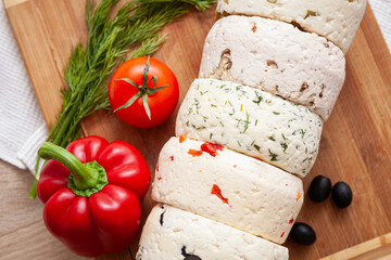 Homemade Organic Cheese with Tomatoes, herbs, papper and olives