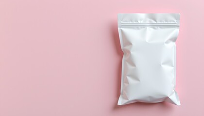 A white bag of chips is placed against a plain pink background.