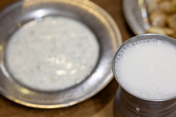 Close-Up of Traditional Turkish Ayran Served in a Metal Cup
