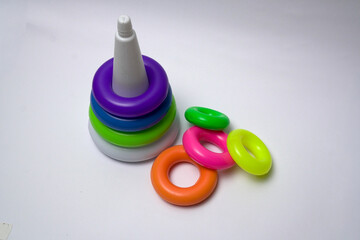 Colorful stacking rings toy partially assembled for kids learning