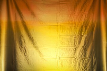 a golden backdrop with a gradient effect