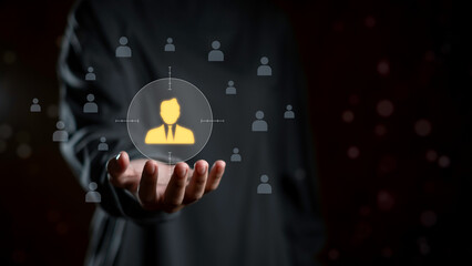 HR manager human resources concept with business hand selecting highlighted employee icon on digital network, symbolizing recruitment, leadership, workforce management, and organizational development.