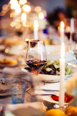 Served for banquet table with wine glass and candles, evening party