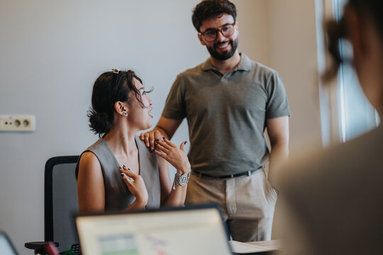 A young couple consulting with an adviser in a bank setting, discussing options such as loans and financial services in a professional, optimistic, and communicative atmosphere. - Powered by Adobe