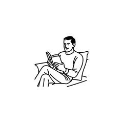 Man relaxing in a chair reading a book