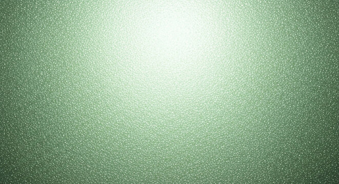 Abstract textured background with a bright light in the center and a subtle green hue, creating a shimmering effect with tiny particles