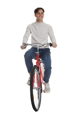 Handsome man riding red bicycle on white background