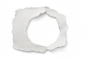 Torn white paper creating a circular ripped hole, providing a textured blank frame on transparent background