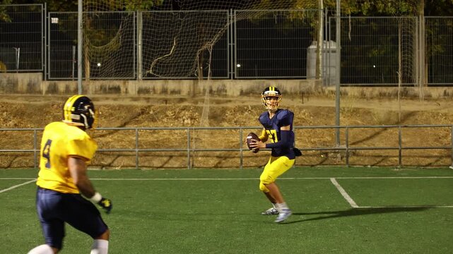 Quarterback throwing a pass during american football game