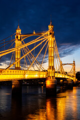 Bright Albert Bridge at dusk in London