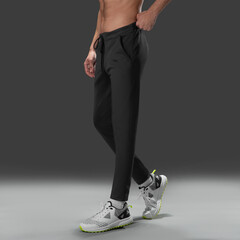 Fit young man wearing sportswear standing in studio