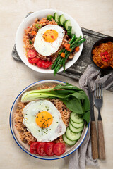 ndonesian nasi goreng (fried rice) served on a plate.