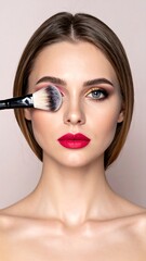 Close-up of woman with makeup application