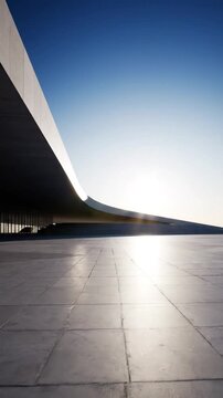 コンクリート建築と晴天と太陽の光の景色