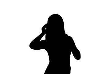 Silhouette of a woman with long hair talking on a cell phone against a white background