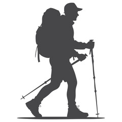 Fototapeta premium Silhouette of a hiker with a backpack and trekking poles walking