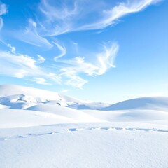 Snow-covered dunes under a vibrant blue sky