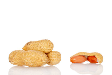 Unshelled peanuts isolated on white background, macro.