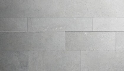 Naklejka premium Gray rectangular stone wall tiles forming an elegant surface texture pattern