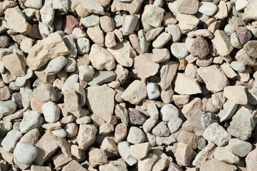 The photo shows a close-up of crushed stone