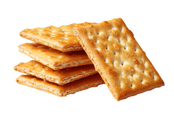 Close up of golden saltine crackers stacked on white background, showcasing their crispy texture and perforations