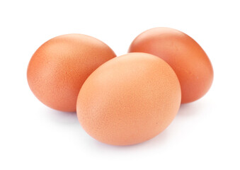 Three raw chicken eggs isolated on white