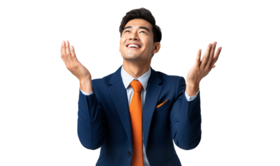 Enthusiastic businessman looking up with open hands, conveying hope, success and gratitude