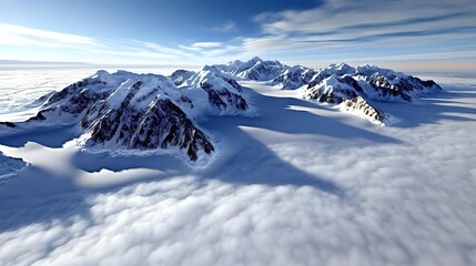 Majestic snow-covered mountain peaks rising above dense white clouds in dramatic winter landscape, aerial perspective showing rugged alpine terrain and pristine wilderness.