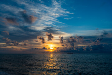 Calm horizon at sea nature. Romantic summer vacation on beach seascape. Sunrise sky horizon. Sea sunset view. Cloudy sunset sky and seascape at summer vacation. Skyscape with sea sunrise. Afterglow