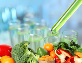 Food laboratory analysis. Test tubes and fresh products