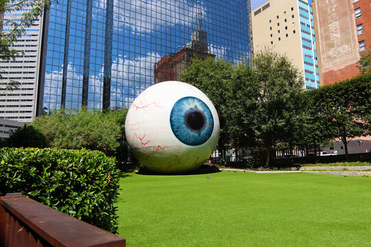 Dallas, Texas USA - 10 04 2025: The iconic &ldquo;Eye&rdquo; sculpture, located outside the Joule Hotel in downtown Dallas, stands prominently on a manicured green lawn. 