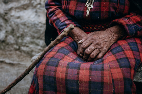 hands of a senior woman - Powered by Adobe