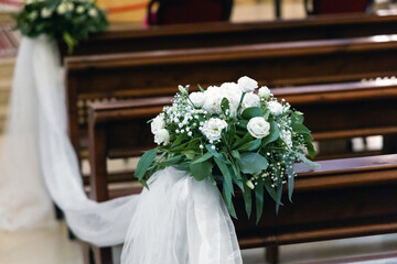 Elegant church interior decorated for holy matrimony