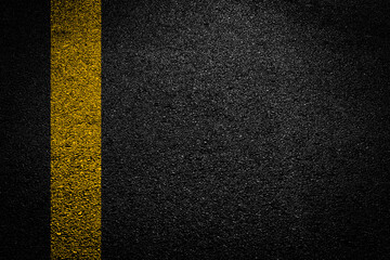 White And Yellow Stripes On Asphalt Road Texture. © Philip