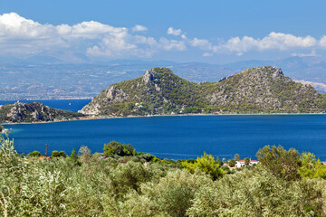 Panoramic view of Perachora lake, a natural reserve surrounded by olive groves, near the town of Loutraki, in Corinth region, Greece, Europe. 