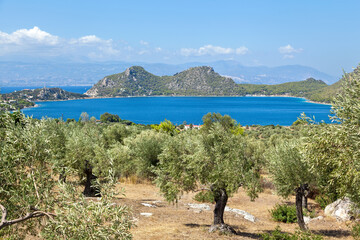 Panoramic view of Perachora lake, a natural reserve surrounded by olive groves, near the town of Loutraki, in Corinth region, Greece, Europe. 